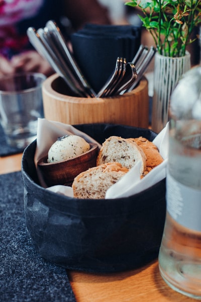 Black pottery bowls on the bread
